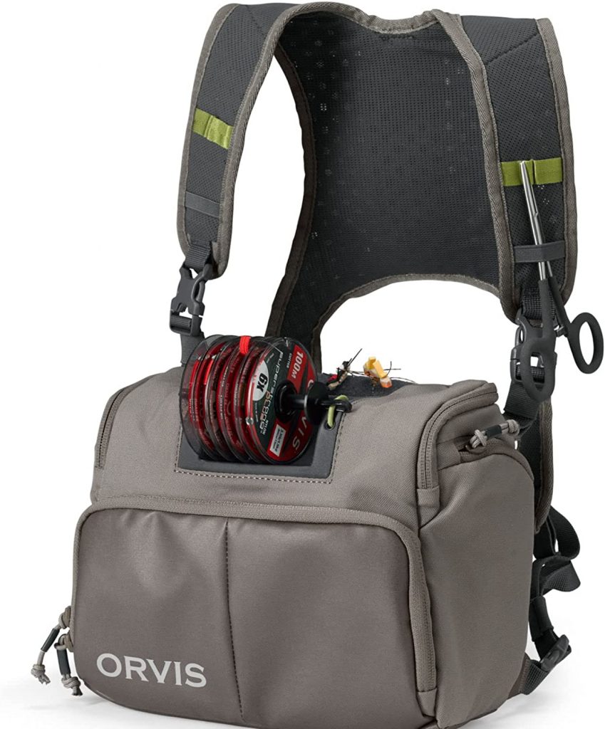 Orvis Chest Pack
It has a docking station and tippet bar for instant access to up to six spools. Large main storage compartment with a wide opening lid that flips down out of the way for easy access to contents.