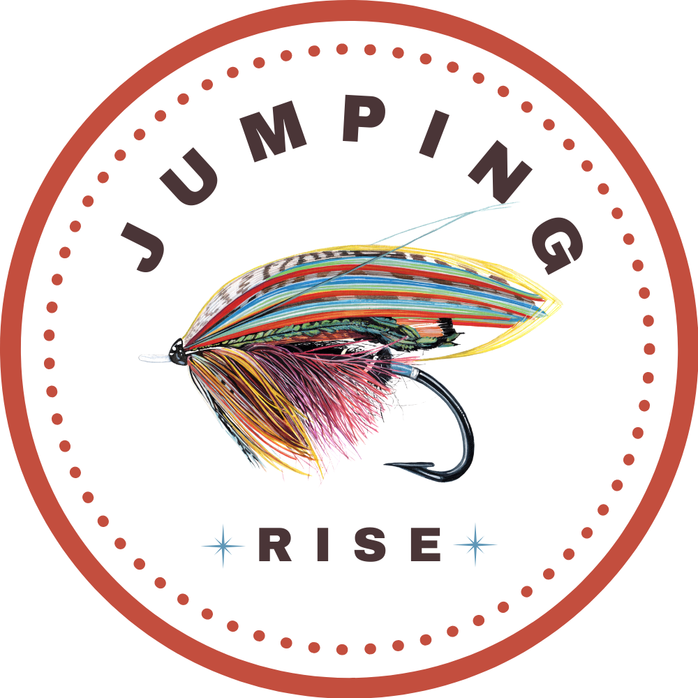 Jumping Rise Logo with colorful Guinea Spade fly in the center.