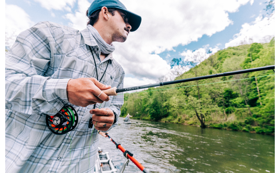 Orvis Fly Fisherman with rod and reel.